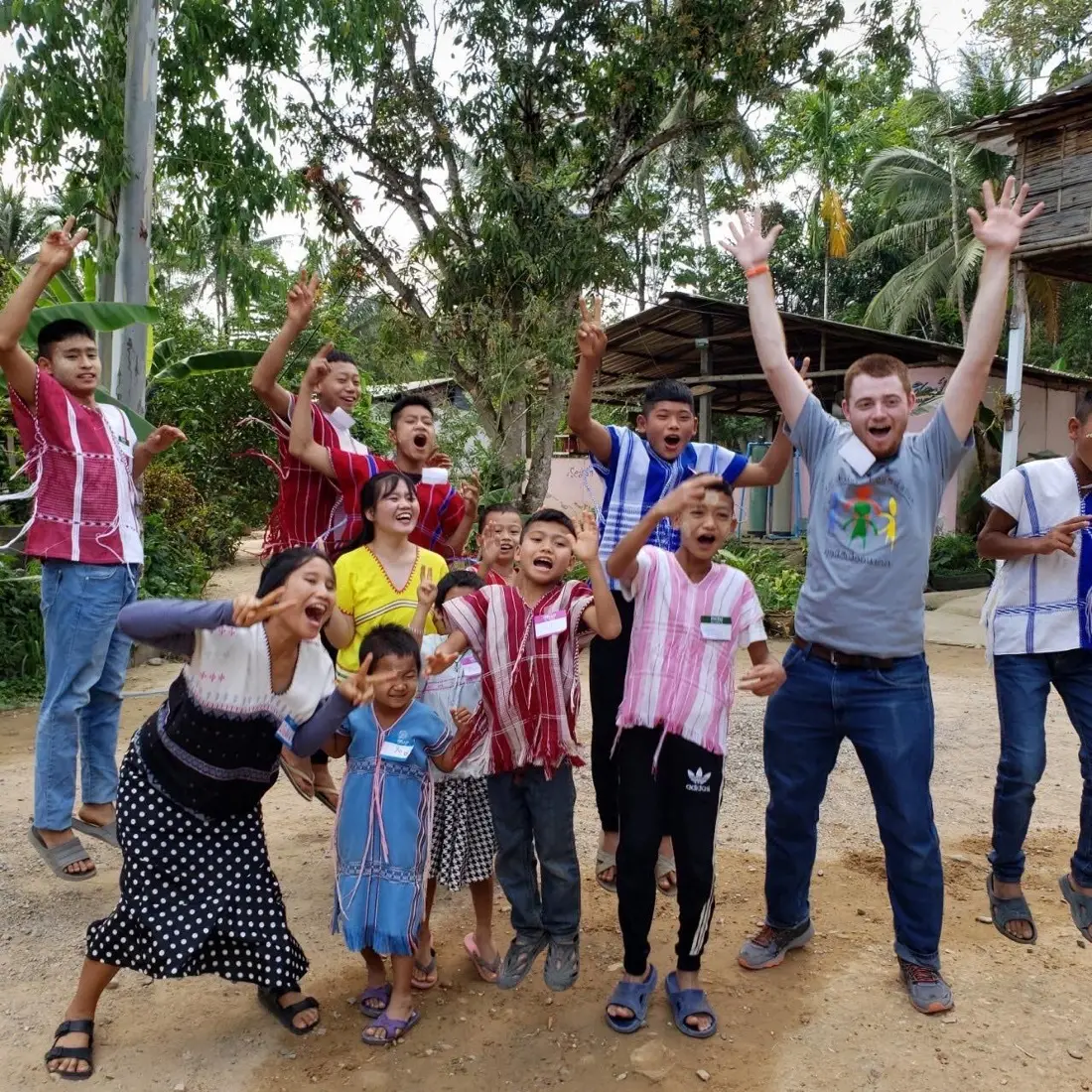 Volunteers with the children at a Thai school